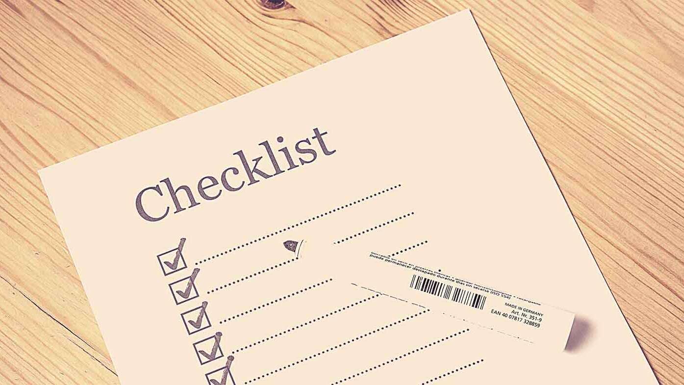 Checkliste mit Stift